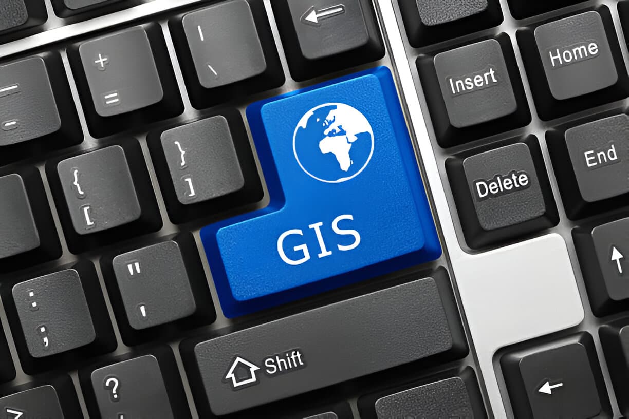 Keyboard with a blue GIS key and globe icon
